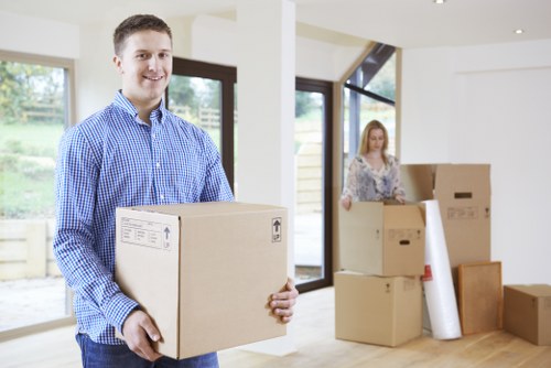Professional moving team handling items at a Petts Wood property