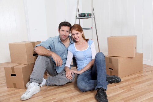 Furniture being carried into a new home during a Petts Wood move