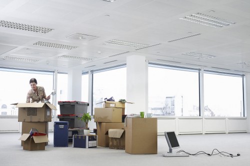 PPE-equipped movers handling furniture safely
